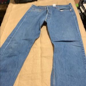 Blue men’s Levi jeans pocket worn slightly